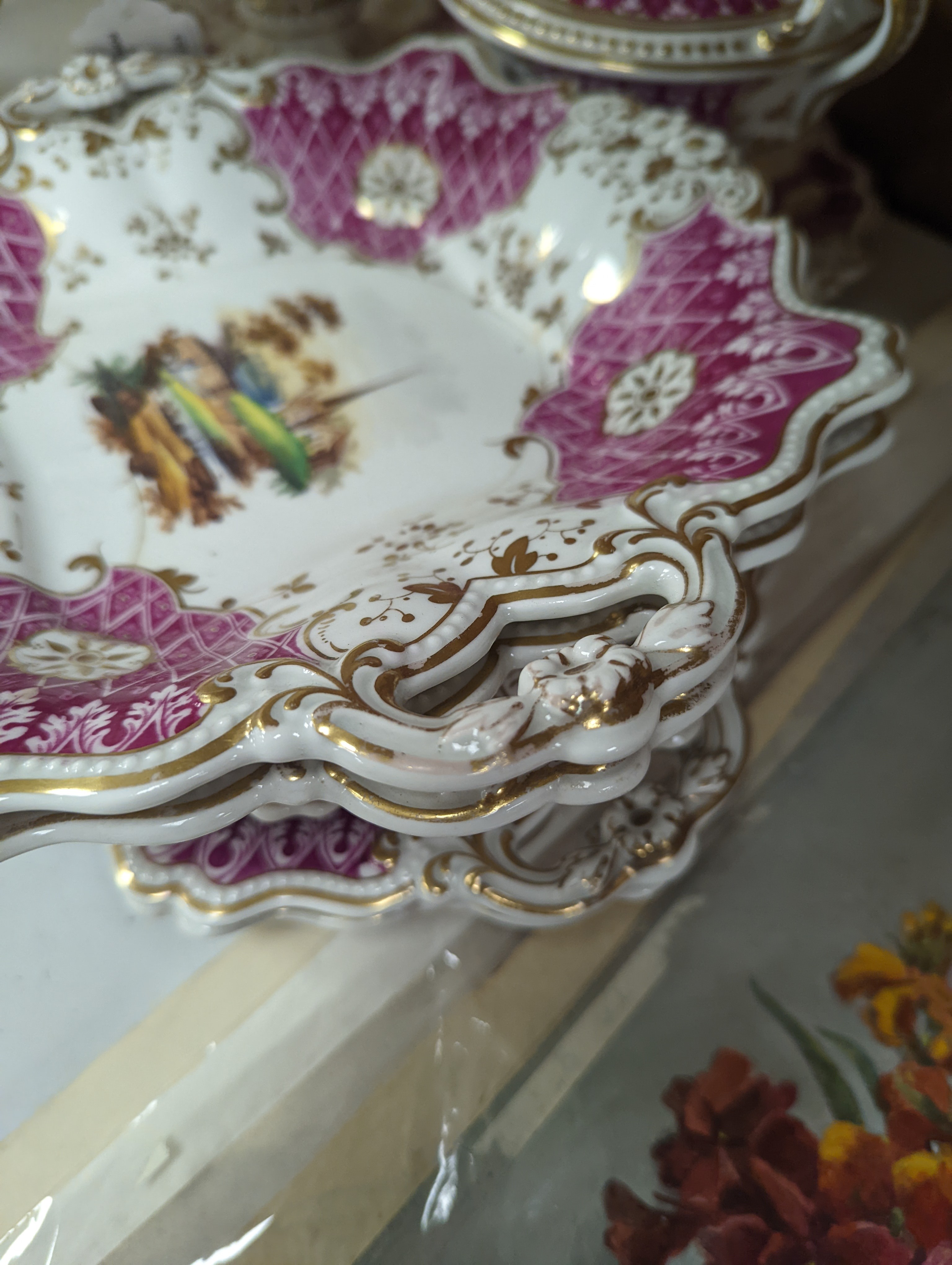 A Ridgways porcelain topographical part dessert service, c.1835, pattern number 2168, the sauce tureens and covers pattern number 2179